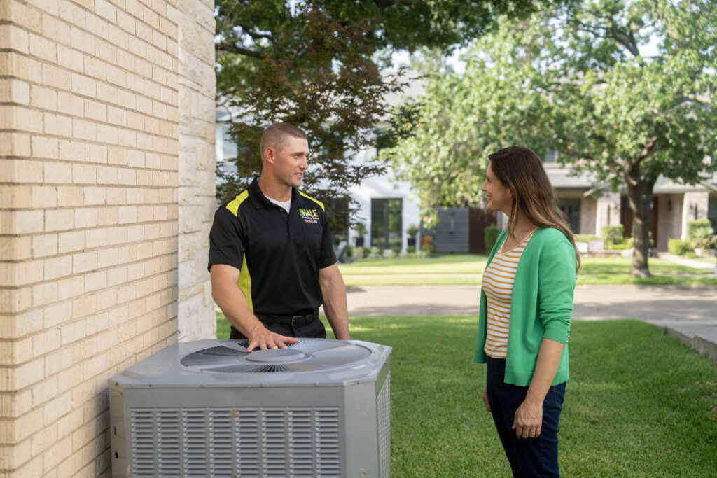 HVAC contractor speaking to customer