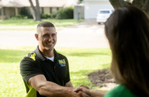 Scott Hale HVAC tech greeting customer