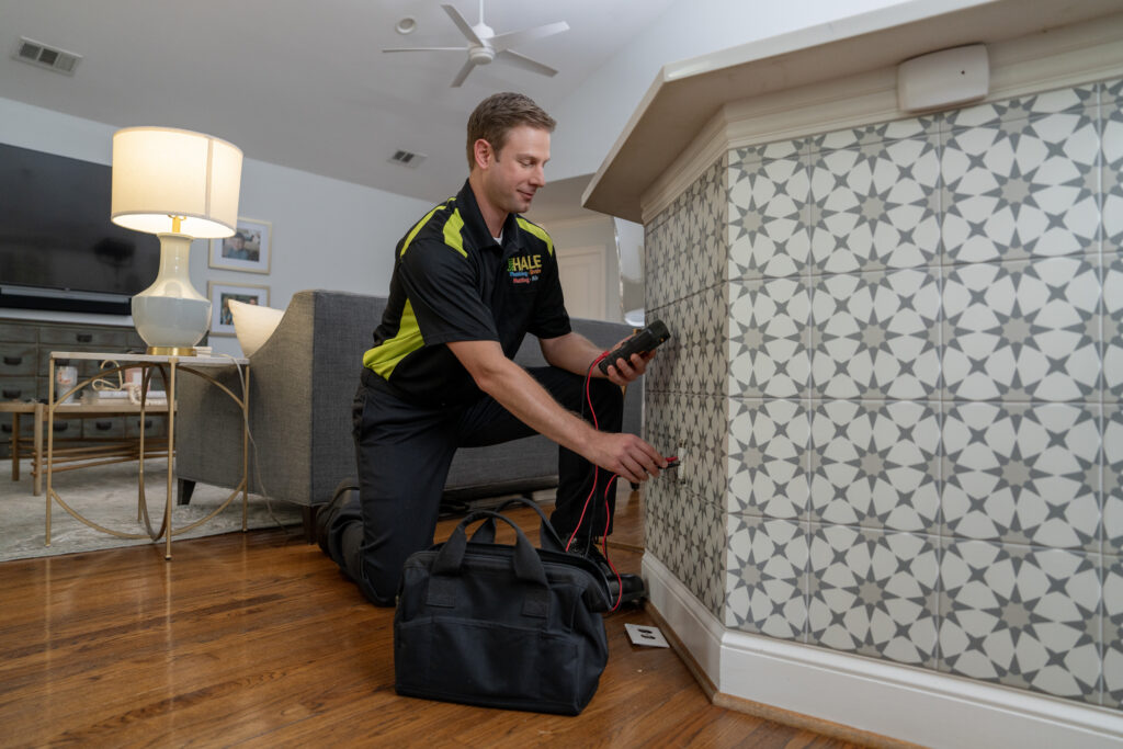 electrician working on kitchen socket